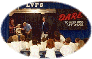 Billy getting his Diploma from Principal Cannon